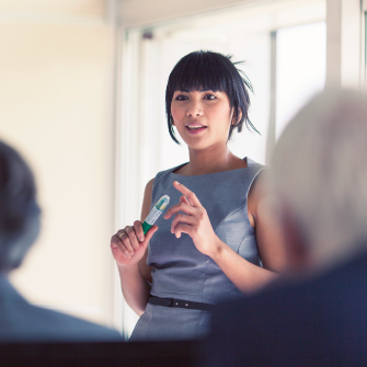 Young professional giving presentation