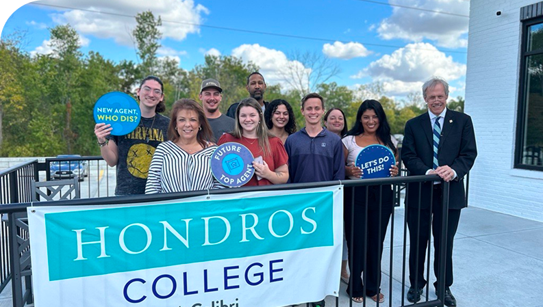 New Hondros College real estate agents celebrating on graduation day